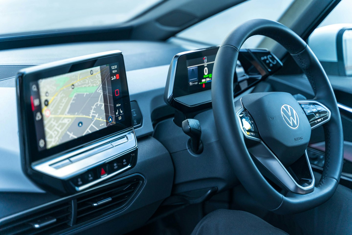 Modern car dashboard displaying a digital GPS map.